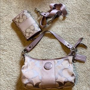 Purple coach bag and wallet. Pics show wear.